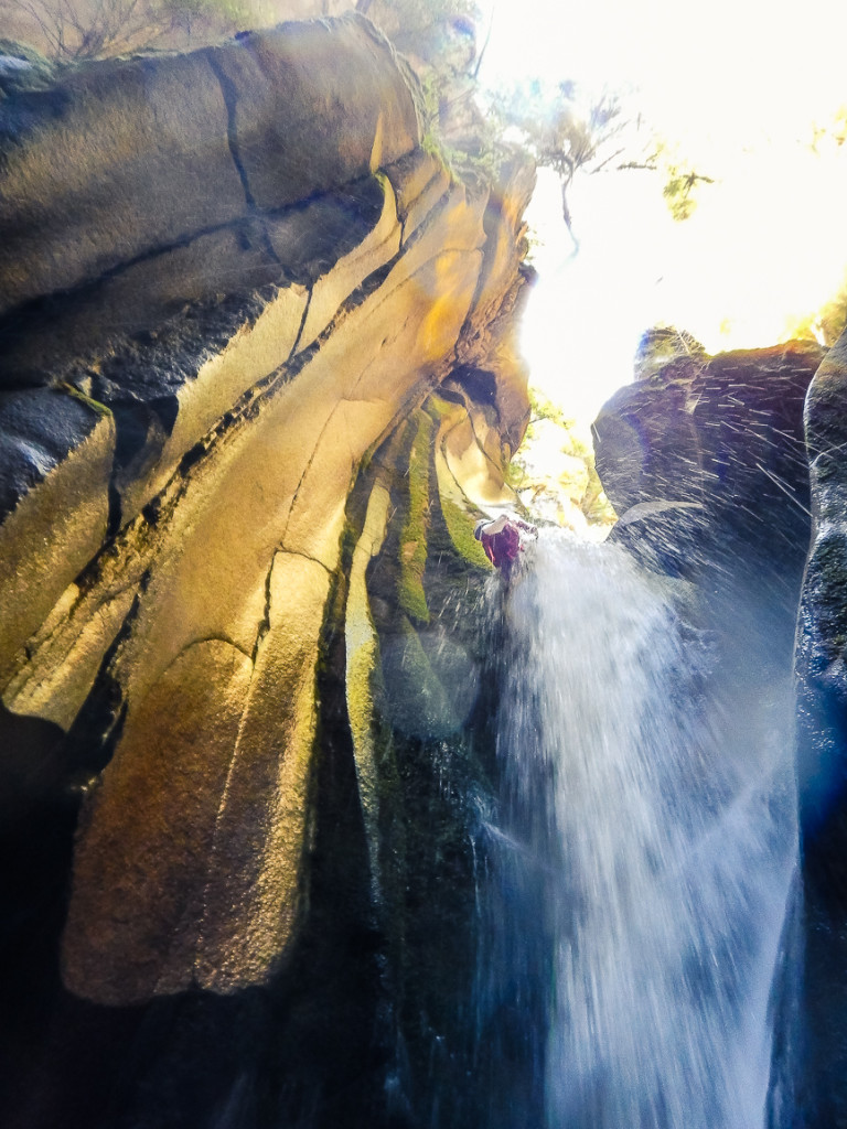 Spring in the waterfall on the 3rd rappel.