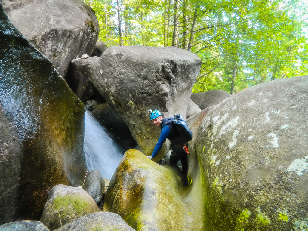 Scrambling slick rock between rappels
