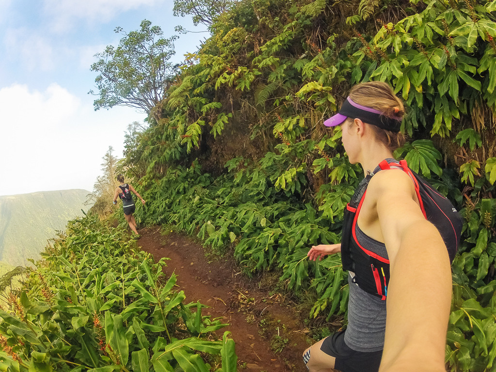 Running on the lush White Road trail near Waimea.
